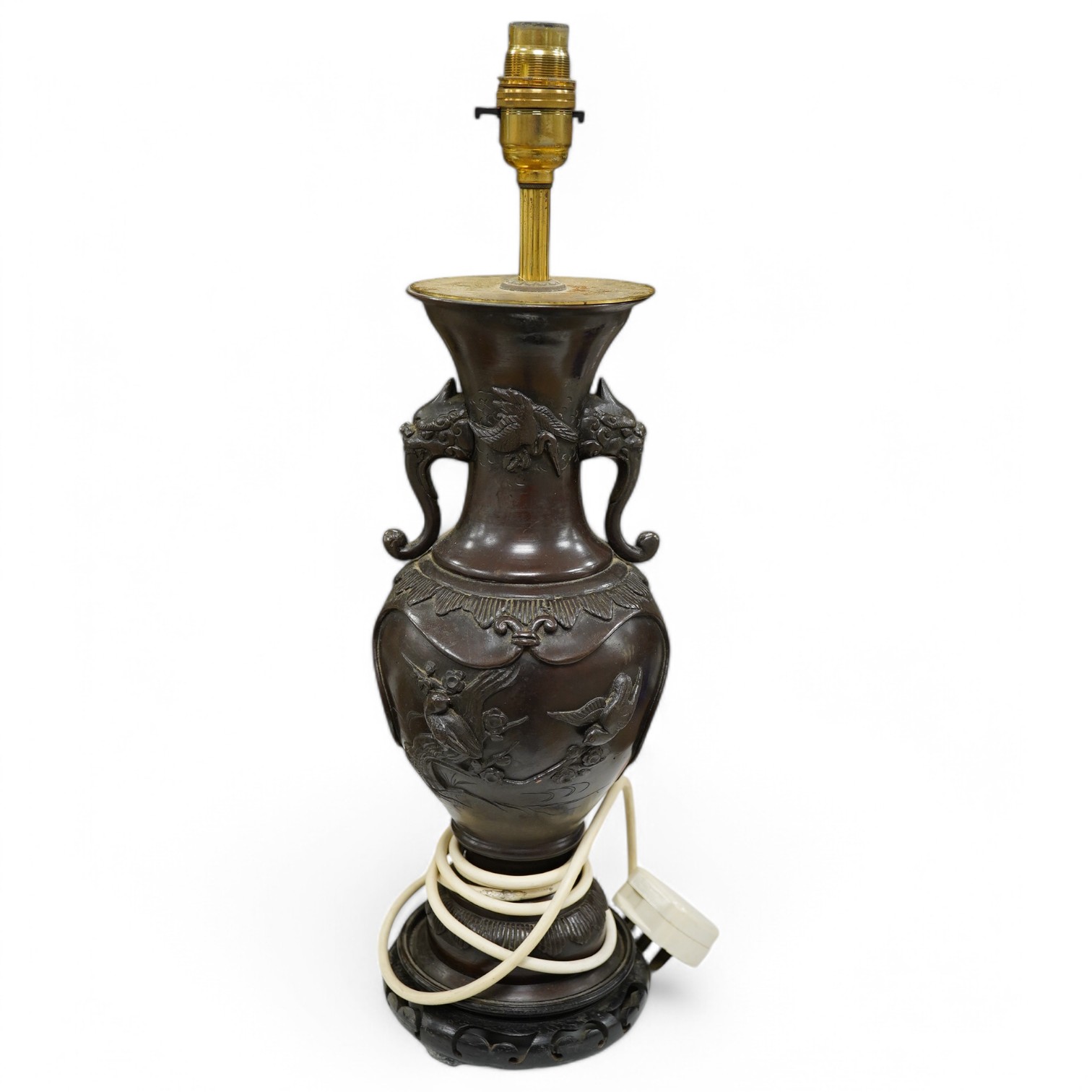 A Japanese bronze vase, converted to a lamp on carved wooden stand, 34.5cm high not including fitting. Condition - drilled to base